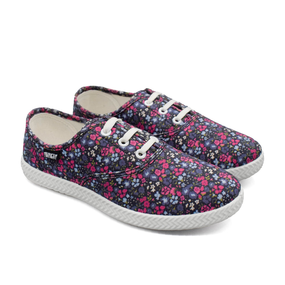 
                      
                        Tomcat Lily Canvas Shoes - Navy (37-42) - Umoja Africa
                      
                    